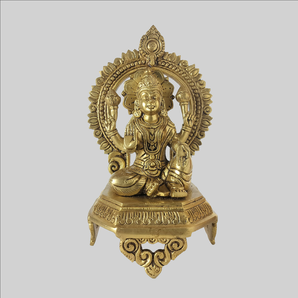 Brass Sitting Laxmi on Octagon with Arch 10.75 in