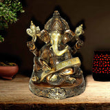 Load image into Gallery viewer, Brass Ganesh Reading Ramayan in 2 Tone Antique Finish 8 in